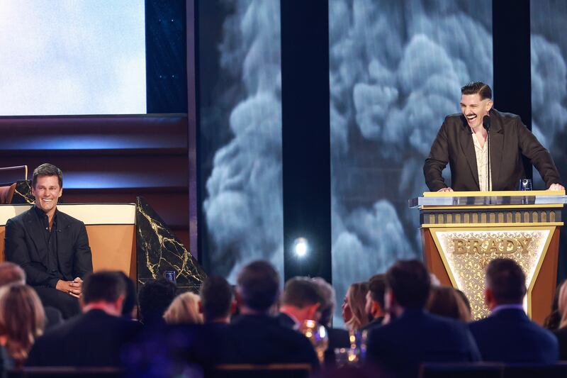 Tom Brady and Andrew Schulz