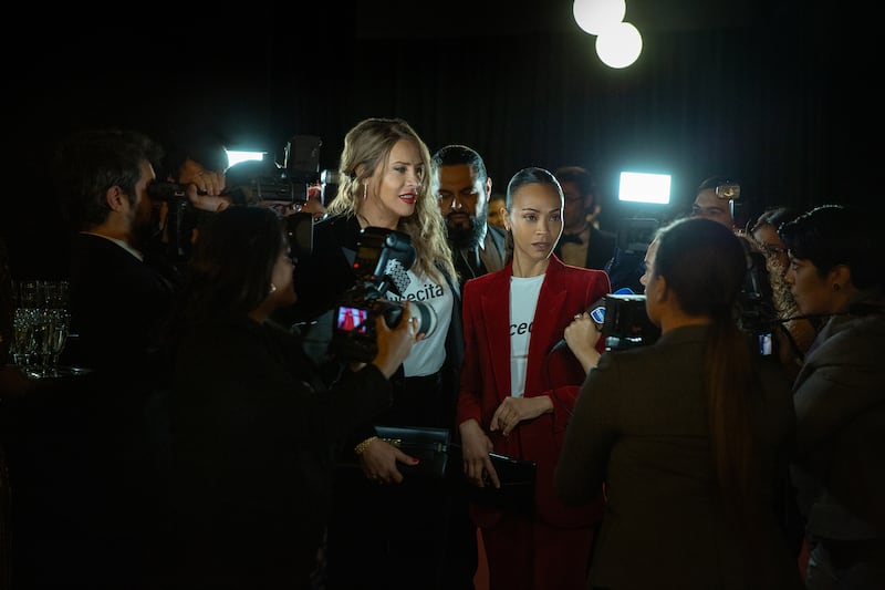 Karla Sofía Gascón as Emilia Pérez and Zoe Saldaña as Rita Moro Castro in Emilia Pérez.