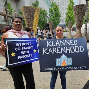 LaTarndra Strong, Olivia Strong, and Heather Redding drove seven hours from North Carolina to protest Moms For Liberty in Philadelphia. 