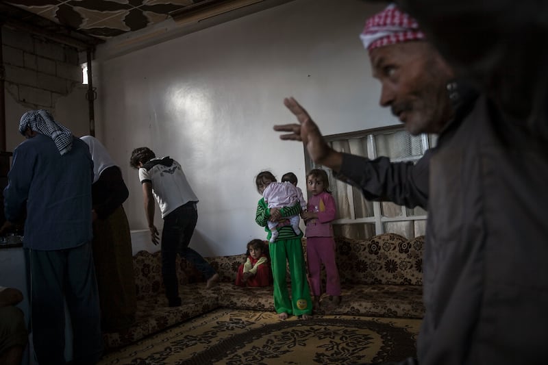 galleries/2013/10/09/the-last-ones-left-photos-of-a-syrian-family-that-refuse-to-leave-their-village/131007-syria-family5_deu89o