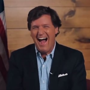 An image of Tucker Carlson from his interview with Donald Trump