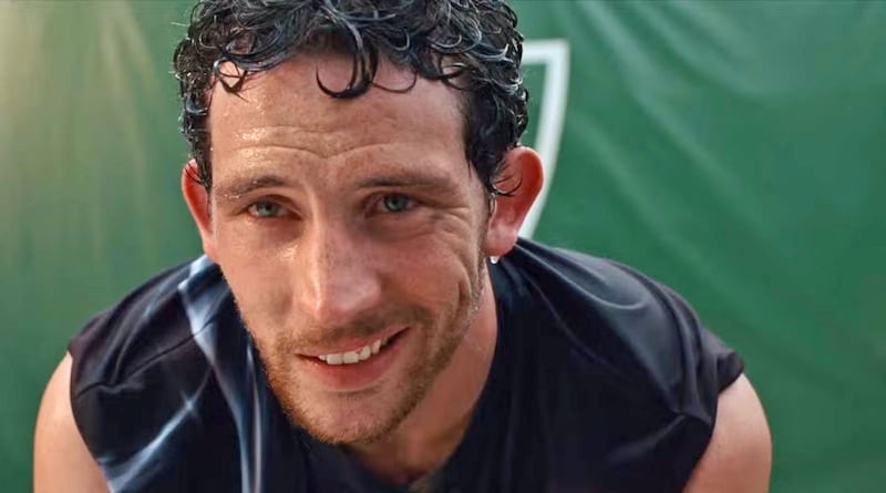 A close up of Josh O'Connor on a tennis court in a still from 'Challengers'