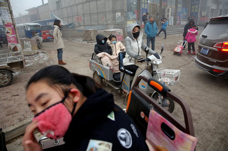 galleries/2014/02/27/smog-vortex-takes-over-beijing-photos/170104-china-smog-01_ugpfdz