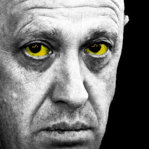 Head of the Wagner Group, Yevgeny Prigozhin, on a black background with yellow eyes.