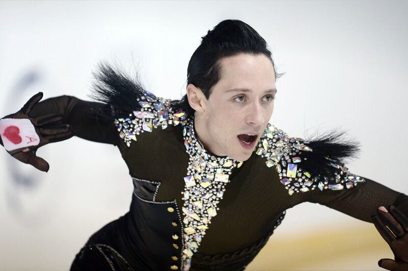 articles/2014/02/25/johnny-weir-and-tara-lipinski-take-on-the-oscars-head-designers-leave-helmut-lang/130917-johnny-weir-olympics-registration-cheat_u1tiz9