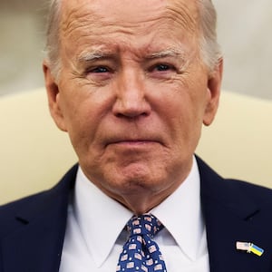 President Joe Biden looks on as he meets with congressional leaders in the Oval Office.