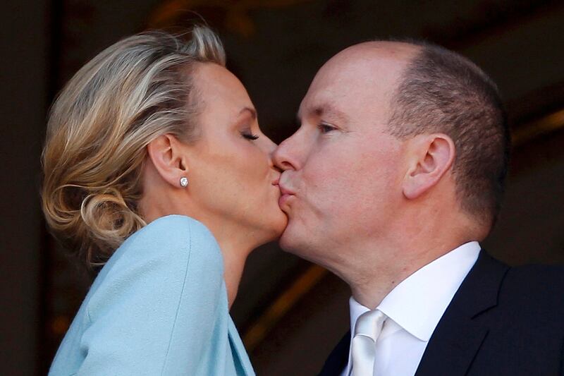 articles/2011/07/02/princess-of-monaco-charlene-wittstock-will-the-kingdom-be-her-personal-hell/monaco-wedding-kiss-sykes_qfxhp4