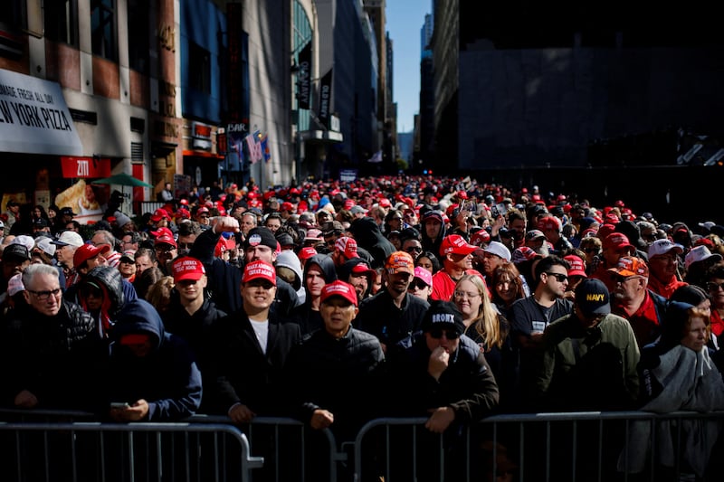 Supporters gather outside Madison Square Garden on the day of a rally for Republican presidential nominee and former U.S. President Donald Trump