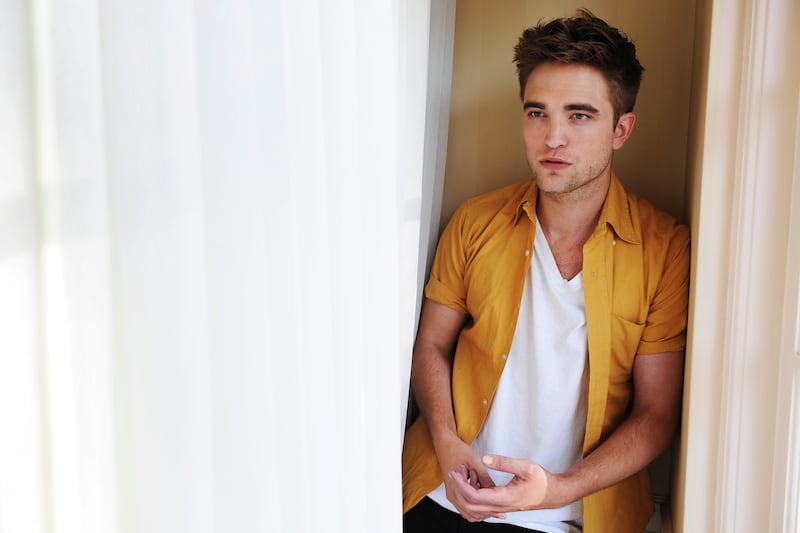 articles/2014/06/13/robert-pattinson-s-life-after-twilight/140612-romano-robert-pattinson-tease_rrayq1