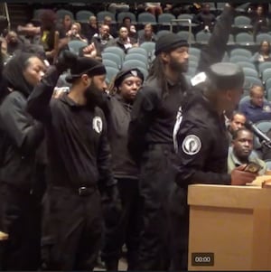 Members of the Black Panthers attend the Powhatan County Public School Board on March 18