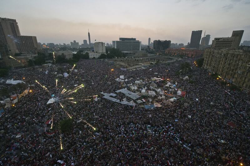 articles/2013/07/03/the-mexican-standoff-in-egypt/tahrir-fireworks-openz_hgqeud