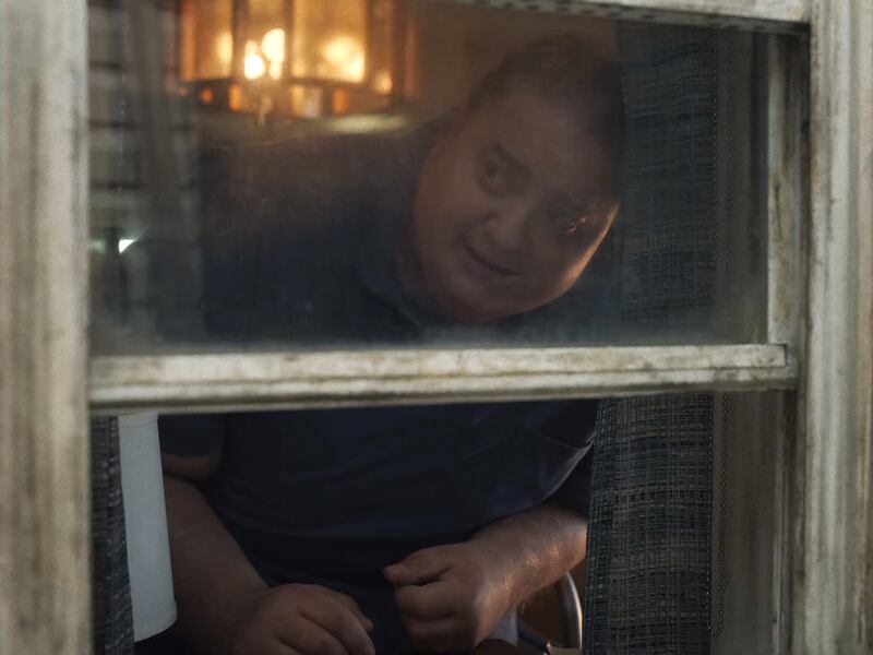 Image: Brendan Fraser in 'The Whale' looking out the window.