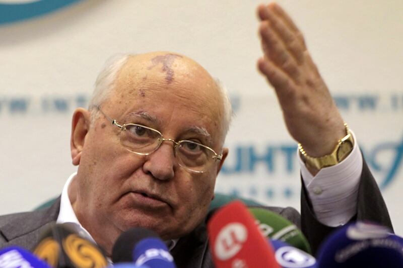 articles/2011/08/21/mikhail-gorbachev-compares-putin-s-policies-to-stalin-s/gorbachev-putin-nemtsova_lmocqc