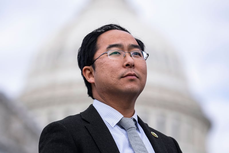 A photo of Andy Kim in front of the capitol