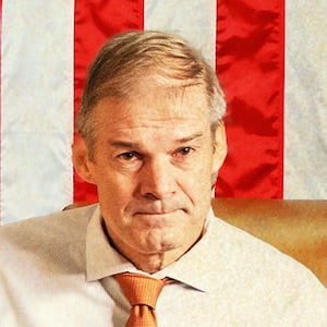 A photo illustration of Jim Jordan as speaker of the house, behind a podium with a gavel in hand