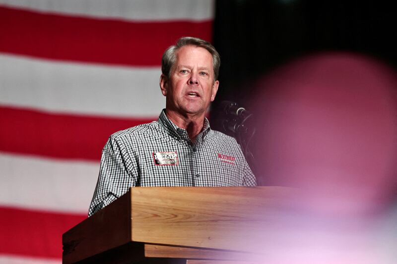 A photo of Georgia governor Brian Kemp speaking in Kennesaw