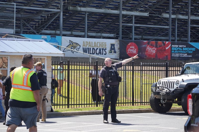 Students are directed to be picked up by their parents after a school shooting Wednesday in Winder, Georgia.