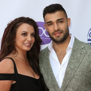 Britney Spears and Sam Asghari attend a 2019 awards show.