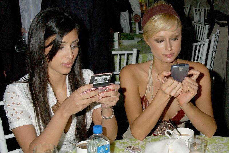 articles/2014/05/27/never-forget-kim-kardashian-s-days-as-paris-hilton-s-lowly-assistant/140527-zimmerman-kimk-tease_ot18xn