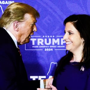 Former President Donald Trump greets Rep. Elise Stefanik (R-NY) during a campaign event in Concord, New Hampshire