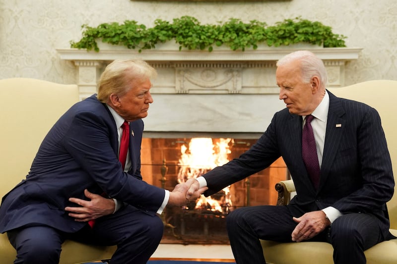 U.S. President Joe Biden meets with President-elect Donald Trump in the Oval Office at the White House in Washington, U.S., November 13, 2024.