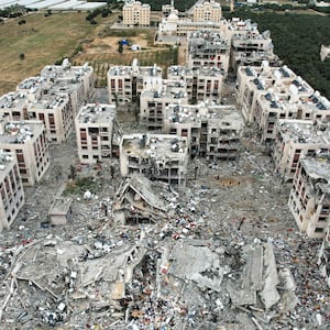 A photo including an aerial view showing the destruction caused by Israeli strikes in Wadi Gaza, in the central Gaza Strip