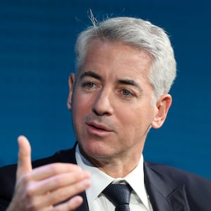 Bill Ackman speaking while wearing a suit and tie