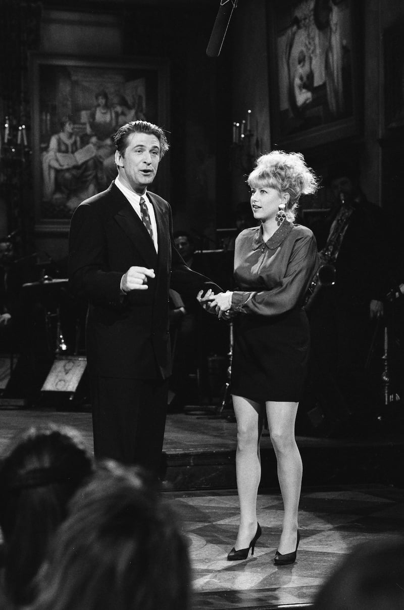 SATURDAY NIGHT LIVE -- Episode 18 -- Pictured: (l-r) Alec Baldwin, Victoria Jackson during the monologue on April 21, 1990 -- Photo by: Alan Singer/NBCU Photo Bank