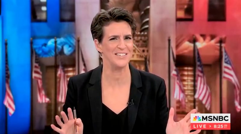 Rachel Maddow gestures with her hands