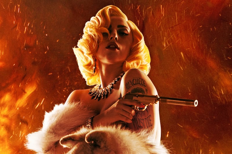 articles/2013/10/08/lady-gaga-s-kick-ass-movie-debut-as-a-sexy-assassin-in-machete-kills/131008-lady-gaga-stern-tease_bidjui