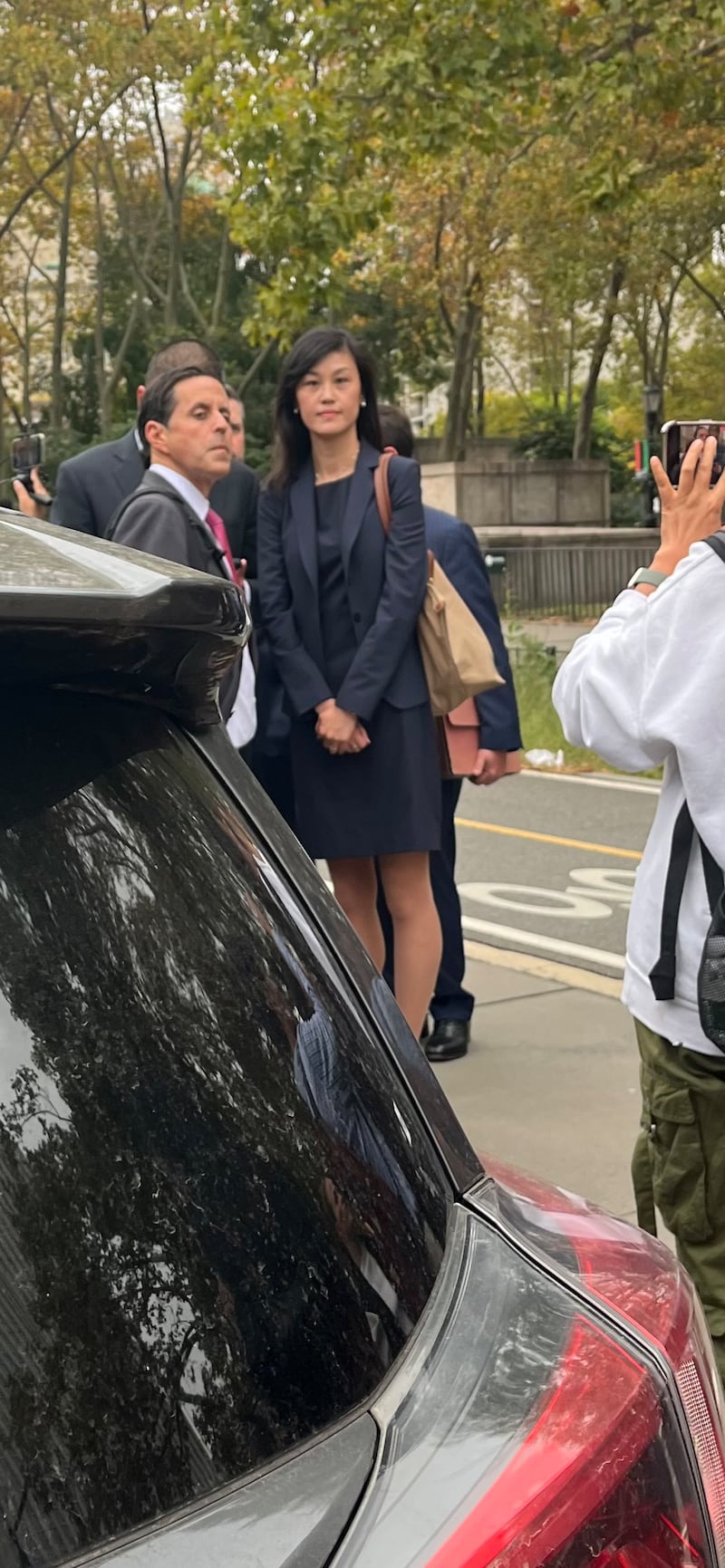 Linda Sun after her hearing in Brooklyn federal court.