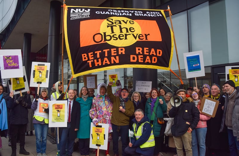 Artist Grayson Perry (centre-left) at the picket outside The Guardian offices