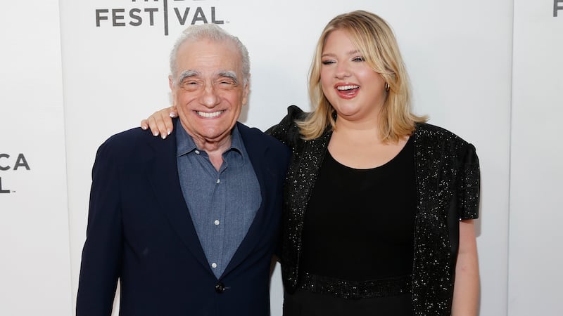 A photo of Martin Scorsese and Francesca Scorsese attending a red carpet in New York City.