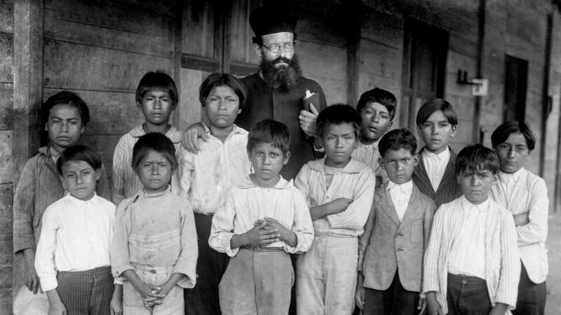 missionary-with-indigenous-shuar-children-from-gualaquiza-morona-santiago-anya-yala-cultural-center-circa-1925-1935-_ct2smf