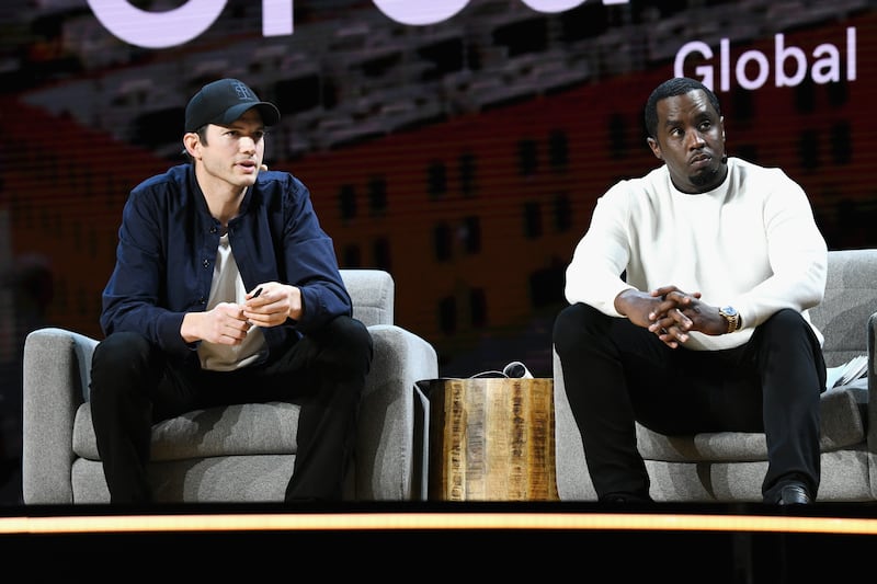 Ashton Kutcher (L) and Sean Combs.