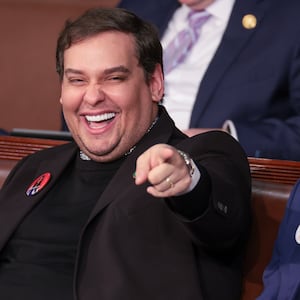 Former U.S. Rep. George Santos (R-NY) (L) sits with Rep. Matt Gaetz (R-FL) at U.S. President Joe Biden's State of the Union address.