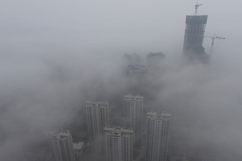 galleries/2014/02/27/smog-vortex-takes-over-beijing-photos/140226-china-smog4_qmimjc