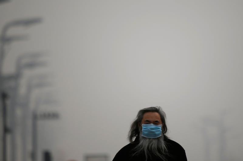 galleries/2014/02/27/smog-vortex-takes-over-beijing-photos/140226-china-smog5_hzlemr