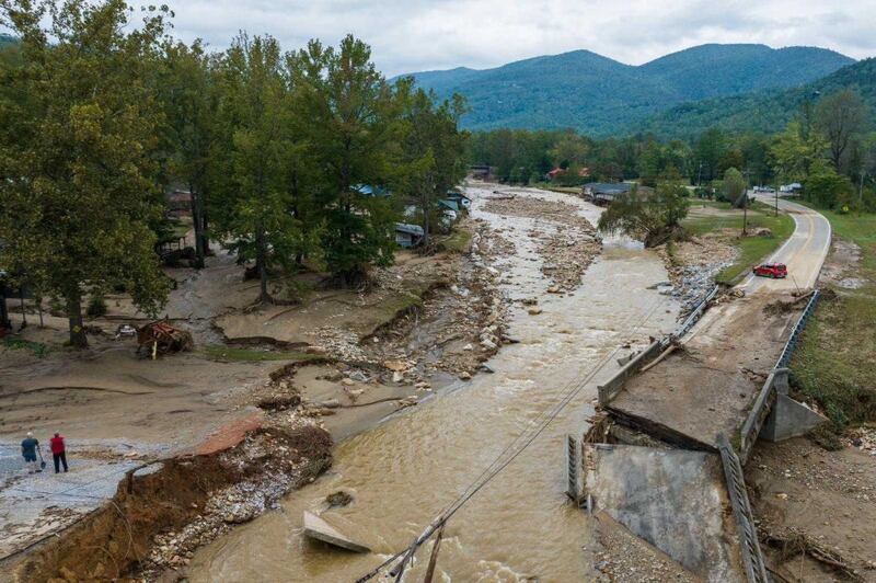 A road destroyed by flood waters photographed from above.