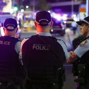 Police keep watch in front of the Westfield Bondi Junction shopping mall after a stabbing incident in Sydney on April 13, 2024.