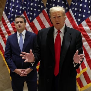 Republican presidential candidate and former U.S. President Donald Trump speaks during a press conference at one of his properties after attending a hearing in New York City.