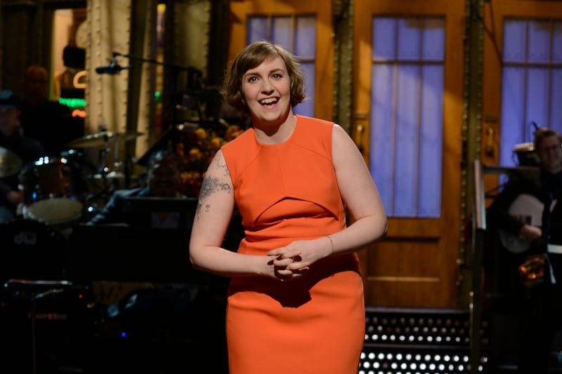 articles/2014/03/09/lena-dunham-on-snl-review-very-funny-very-dunham-y/20140309-fallon-dunham-snl_onds56