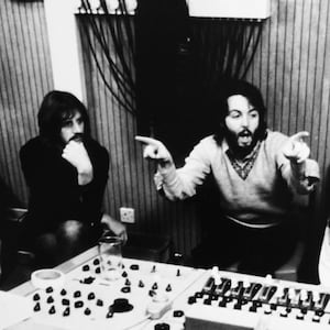 Ringo Starr, Paul McCartney, George Harrison, Yoko Ono, and John Lennon in the studio in a still from ‘Let it Be’