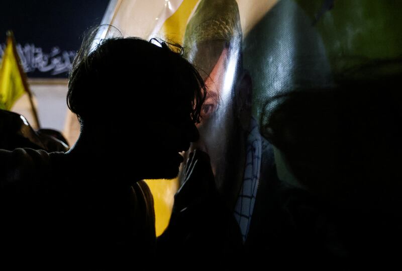 A mourner reacts during the funeral of members of Harakat al-Nujaba, killed by a U.S. military strike which targeted a leader of the group in Baghdad, Iraq.