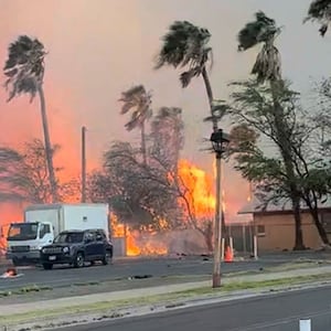 Smoke and flames rise in Lahaina, Maui County, Hawaii, U.S., August 8, 2023 in this still image from video obtained from social media.