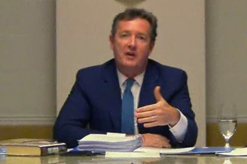 articles/2013/12/12/piers-morgan-joked-about-phone-hacking-with-murdoch-editor/131211-piers-morgan-tease_srcgly