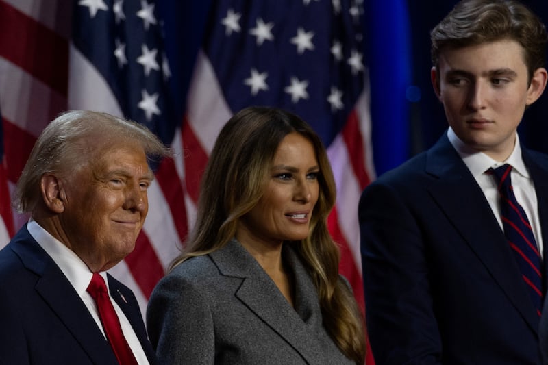 Donald Trump, left, with Melania and Barron Trump, November 6, 2024.