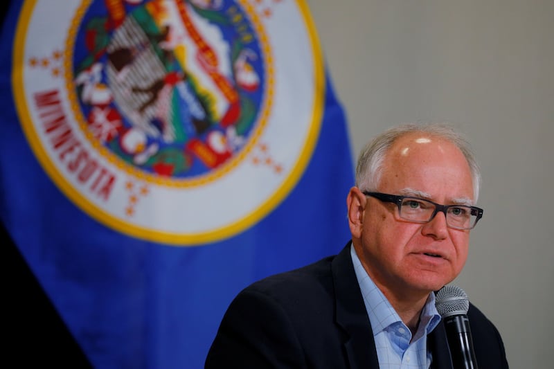 Democratic Governor Tim Walz participates in a gun violence prevention roundtable.