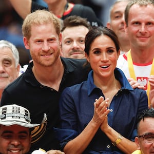 Britain's Prince Harry, Duke of Sussex and his wife Meghan, Duchess of Sussex pose with the medalists after the sitting volleyball final at the 2023 Invictus Games in Düsseldorf, Germany September 15, 2023.