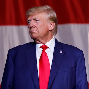 Donald Trump standing in front of a podium.